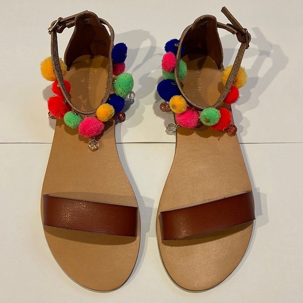 Tan sandals with Pom Pom details